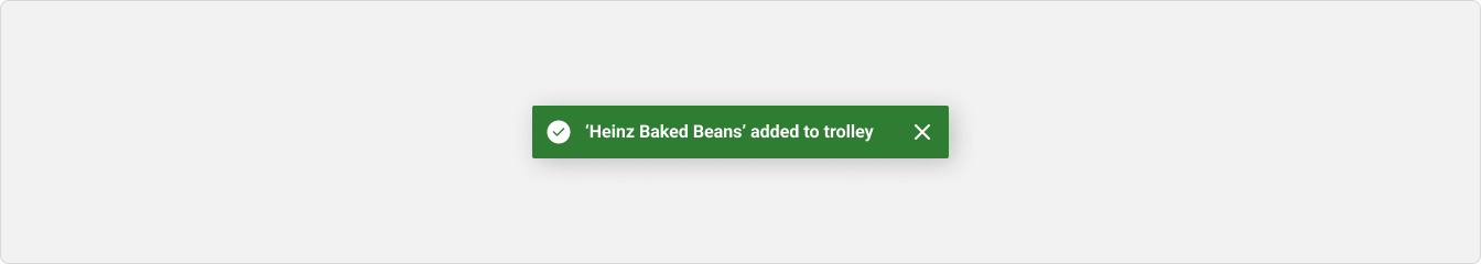 A success toast message that reads ''Heinz Baked Beans' added to trolley' and a close icon button sits beside the message