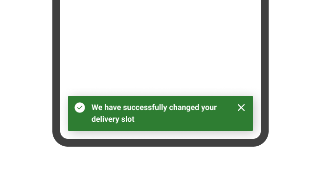 An success toast message reading 'We have successfully changed your delivery slot'